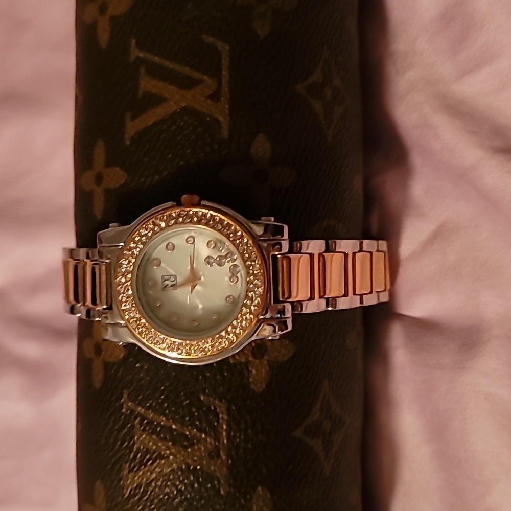 NY & Co Elegant Gold and Silver Women's Watch Loose Crystal Face & Blinged Bezel